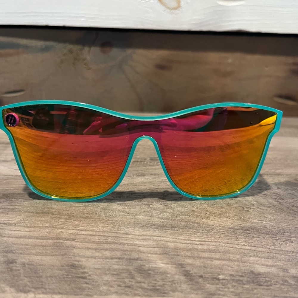 Women’s Blenders Teal Sunglasses with Red-Orange Mirrored Lenses